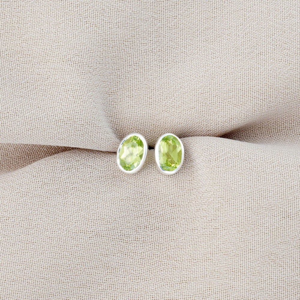 Silver earrings with green Peridot crystal. August birthstone earrings with Peridot earrings in silver.