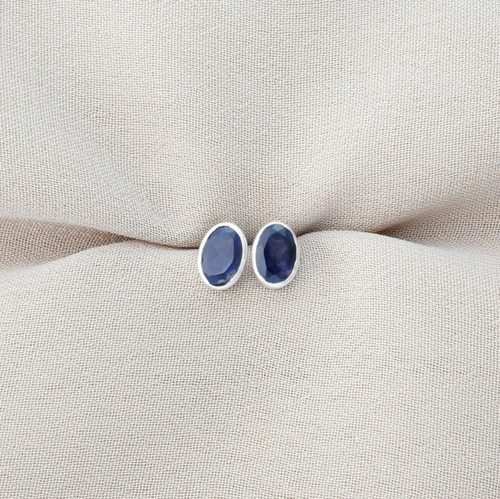Earrings with September birthstone iolite. Silver earrings with blue crystal Iolite.