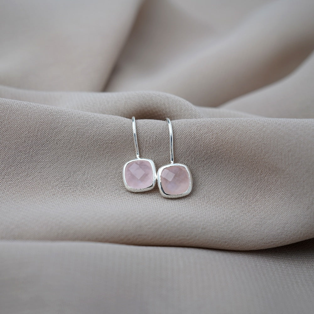 Elegant crystal earrings with Rose quartz, which is October's birthstone. Silver earrings with crystal Rose quartz which is a pink gemstone.