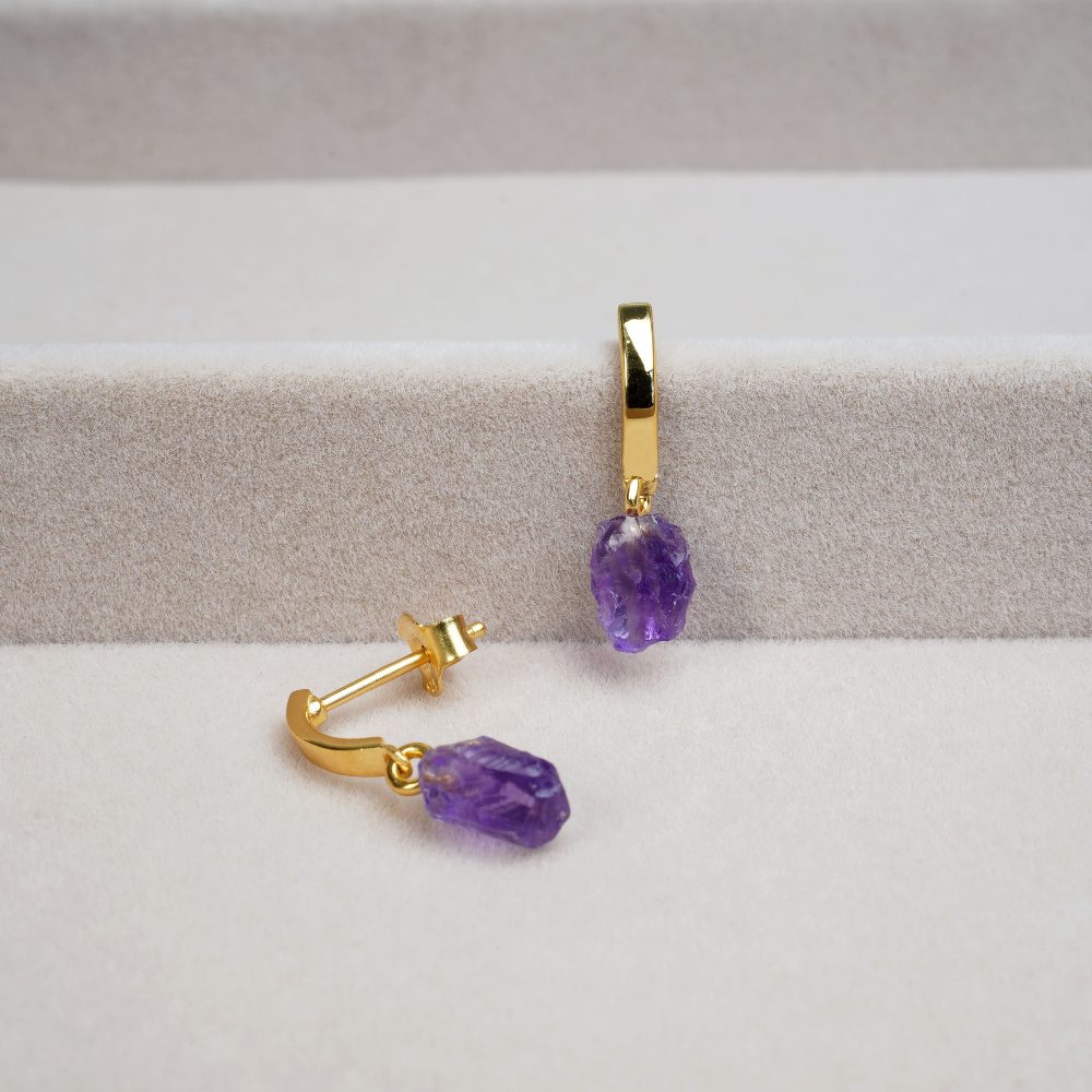 Gold earrings with beautiful purple gemstone Amethyst. Earrings in gold with popular crystal Amethyst.