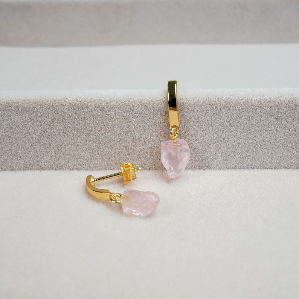 Modern earrings with raw Rose quartz that symbolize love. Beautiful gold earrings with small raw pink crystal Rose Quartz.