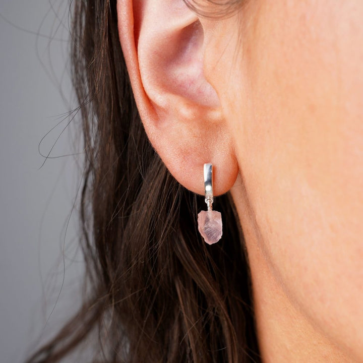 Silver earrings with Rose quartz, which is October's birthstone. Earrings with Rose quartz in raw form.