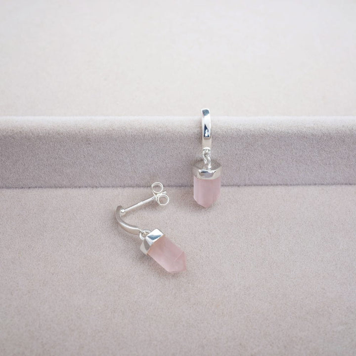 Jewelry with Rose quartz in the form of earrings. Pink crystal earrings with Rose quartz in silver.