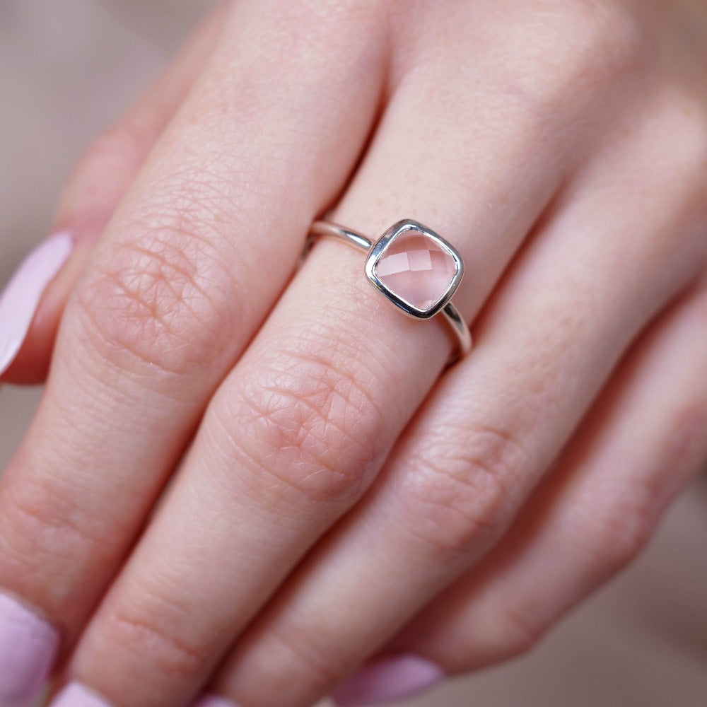 Elegant crystal ring with pink Rose quartz that symbolizes love. Silver ring with crystal Rose quartz which is October's birthstone.