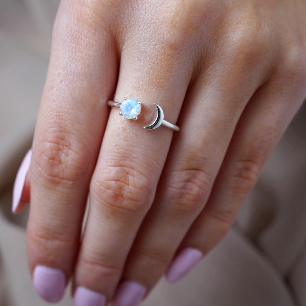 Moon ring with Rainbow Moonstone crystal which is the birthstone of June. Silver ring with moon and Rainbow moonstone which is a beautiful crystal.