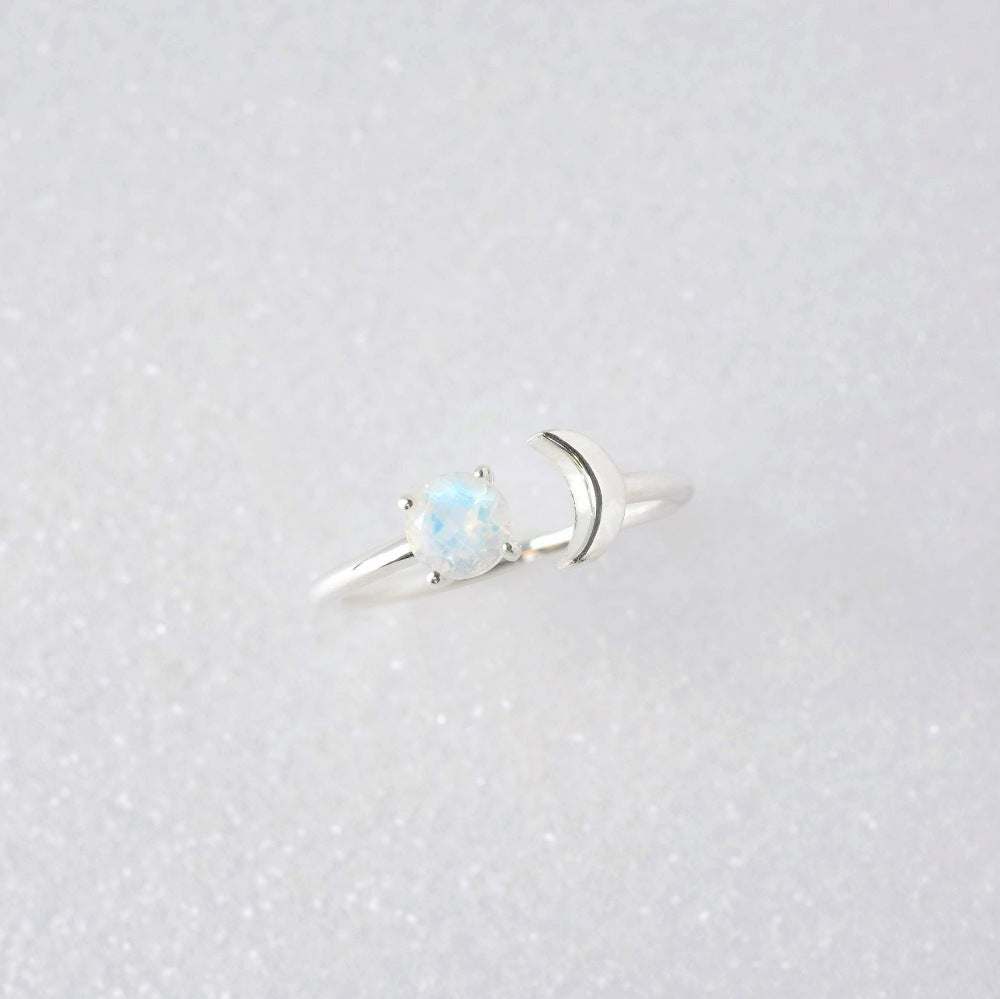 Magical moon ring with crystal Moonstone which is the birthstone of June. Silver ring with moon and the Rainbow Moonstone crystal.