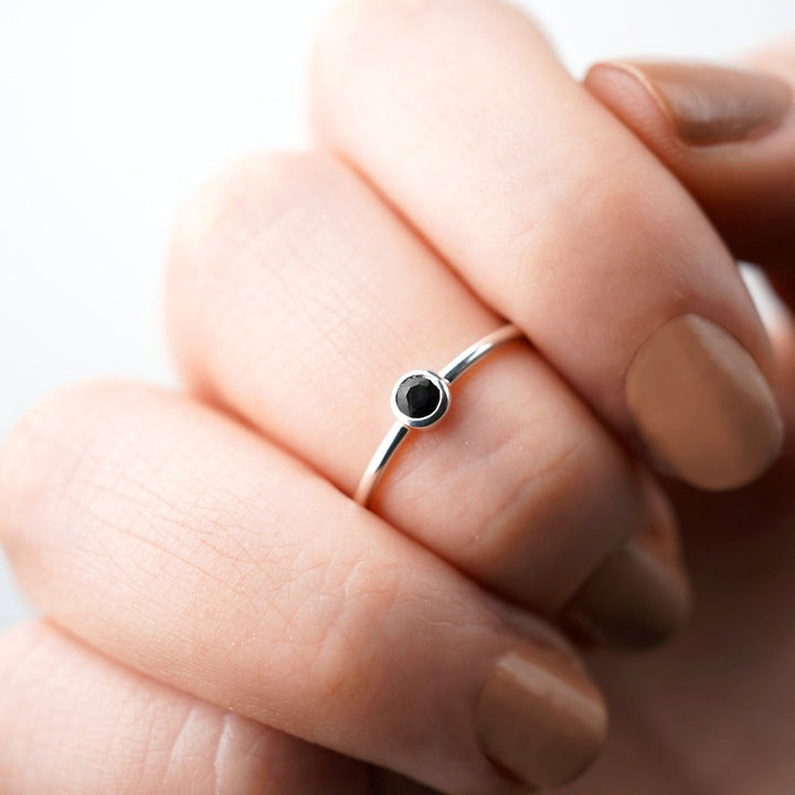 Modern and elegant crystal ring with Onyx. Silver ring with Onyx, the gemstone that stands for protection.