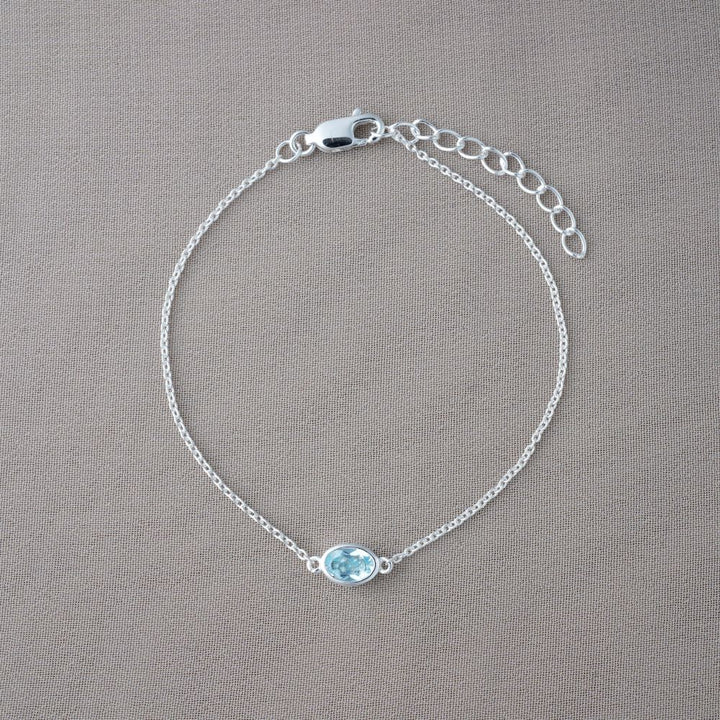 Crystal bracelet with blue Topaz December birthstone. Silver bracelet with blue Topaz gemstone.