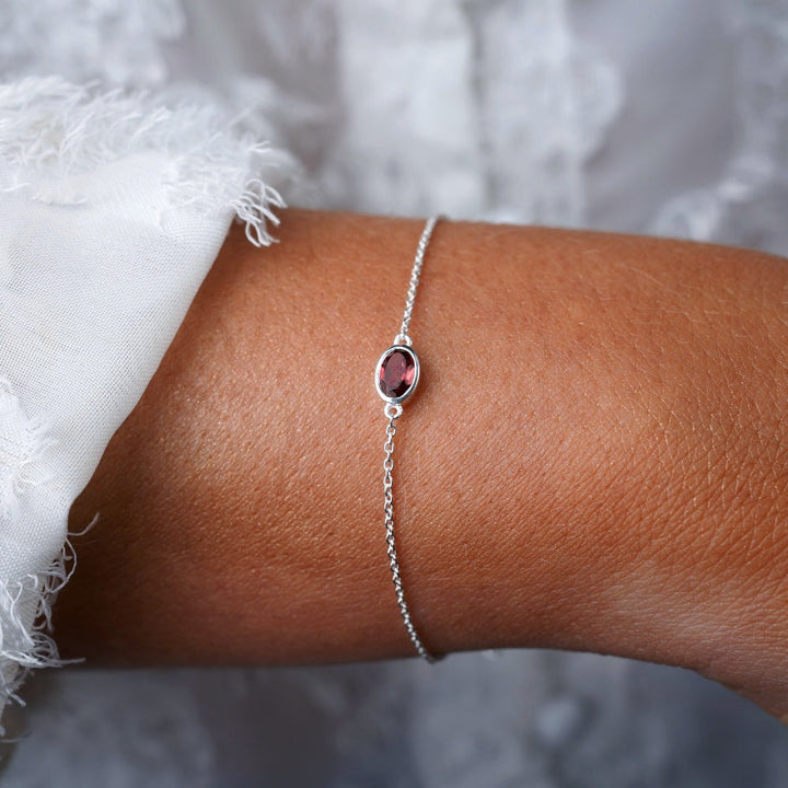 Bracelet with January birthstone Garnet in silver. Crystal bracelet with red crystal Garnet in sterling silver.