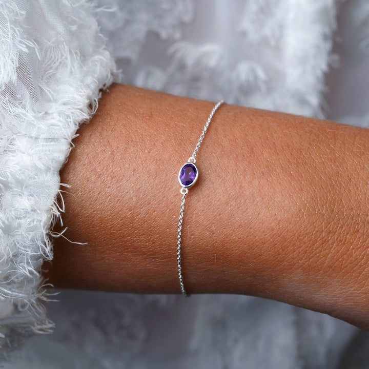 Silver bracelet with purple crystal Amethyst. Bracelet with February birthstone Amethyst in silver.