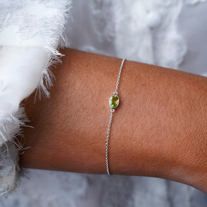 Crystal bracelet with green stone Peridot. Silver bracelet with green gemstone Peridot which is August's birthstone.