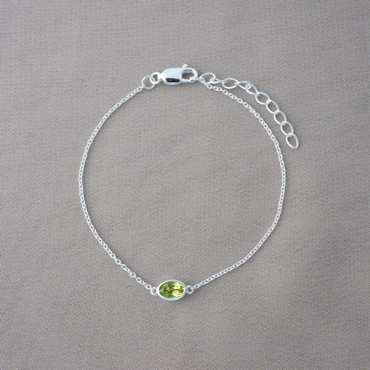 Crystal bracelet with green Peridot gemstone. Silver bracelet with green stone Peridot.