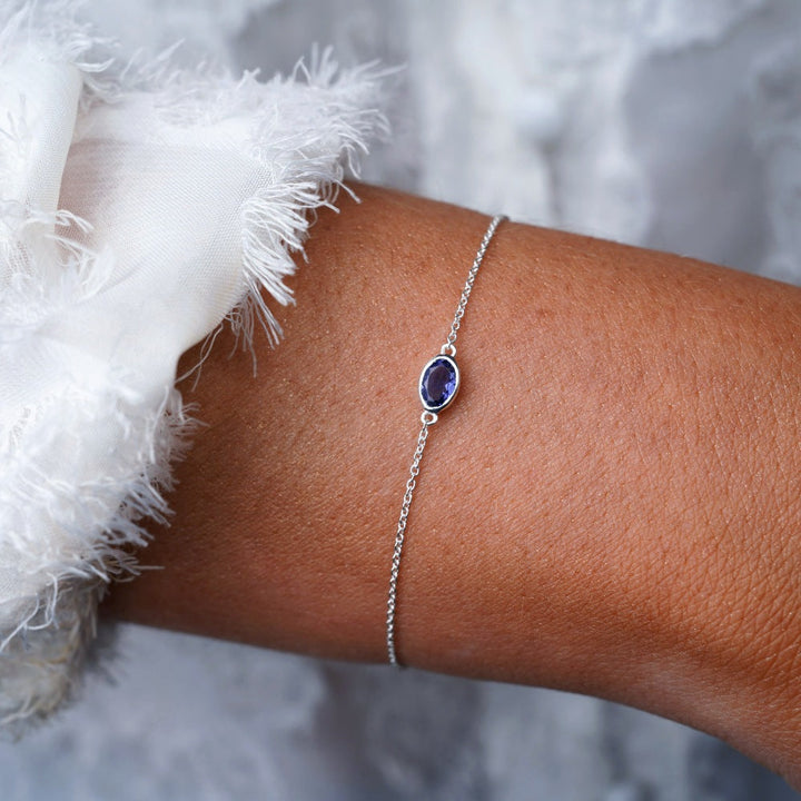 Silver bracelet with September birthstone Iolite. Crystal bracelet in silver with September's birthstone Iolite, which is a blue, purple crystal.