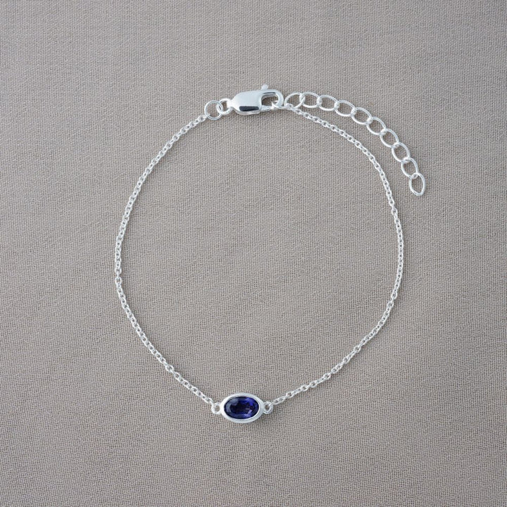 Silver bracelet with September birthstone Iolite. Bracelet in silver with blue, purple crystal Iolite.