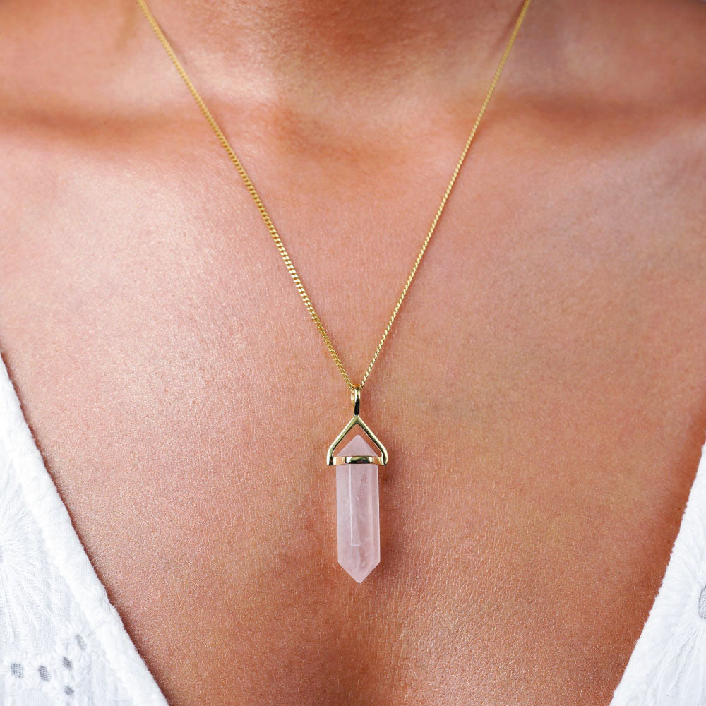 Jewelry with pink gemstone Rose quartz which stands for Love. Necklace with point in Rose Quartz, which is October's birthstone.