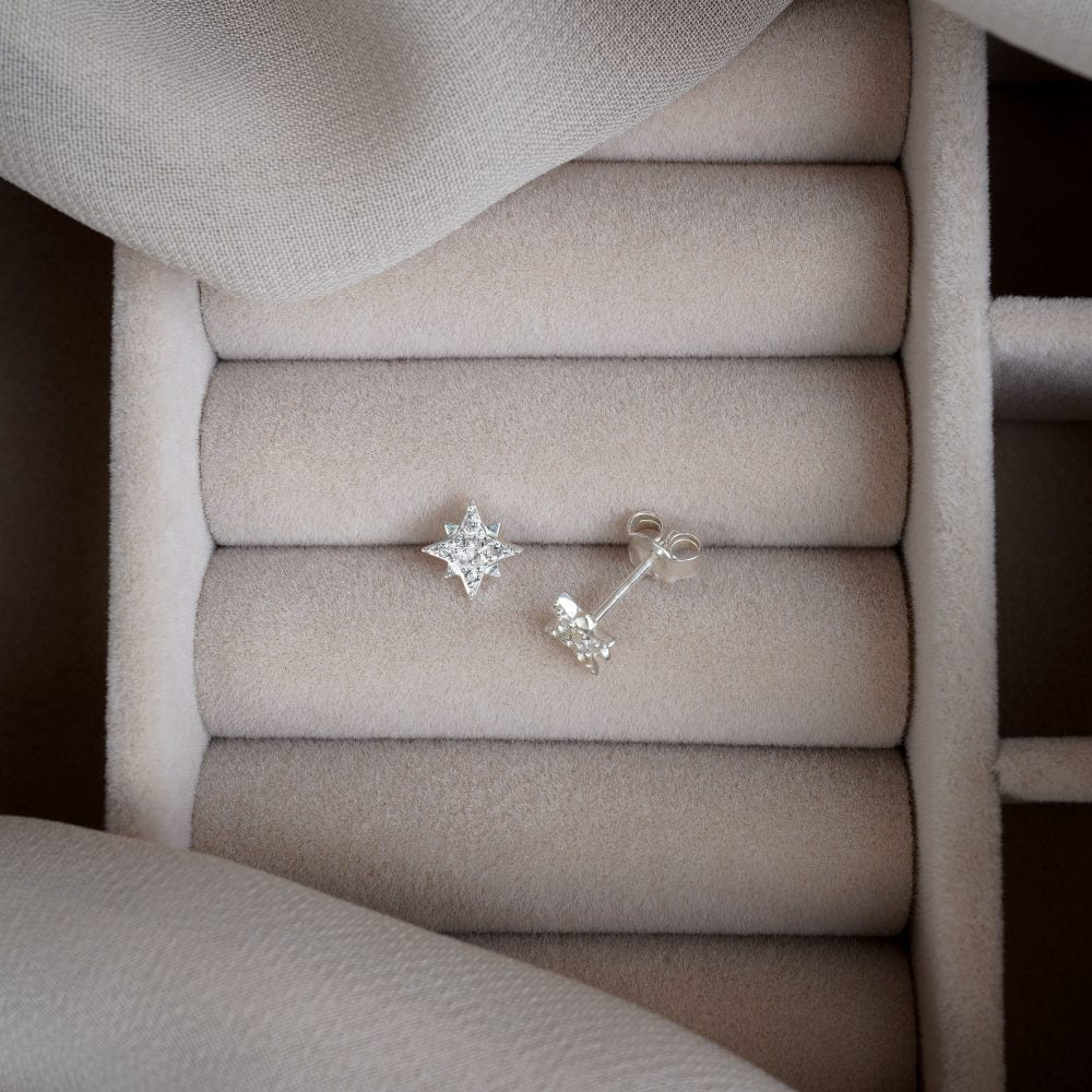 Crystal earrings with magic star in silver. Stud earrings with star in silver and genuine White Topaz gemstones.