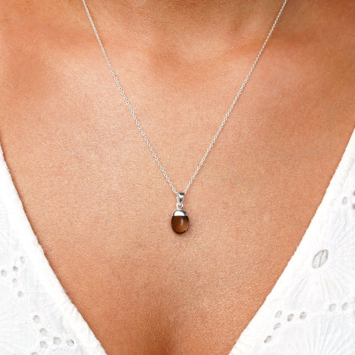 Necklace with Smoky quartz that protects against negative energies. Jewelry with gemstone Smoky quartz in silver which is perfect to wear as a necklace.