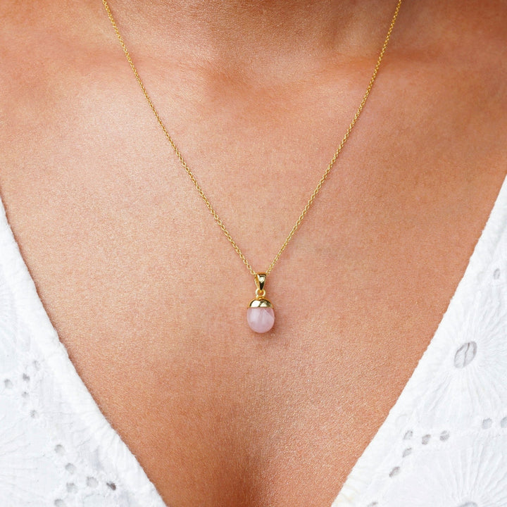 Necklace with pink stone Rose quartz, which is October's birthstone. Rose quartz jewelry in gold that gives loving energy.