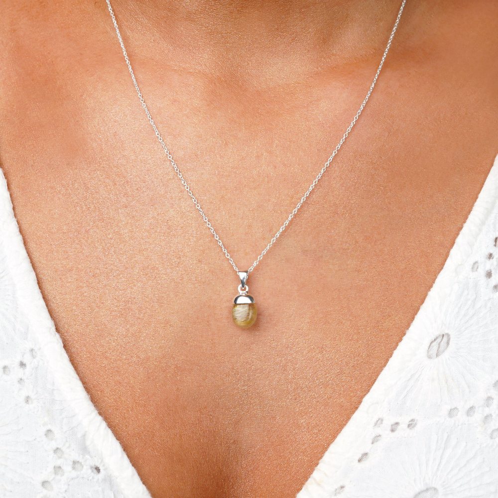 Necklace with crystal Rutile quartz in silver. Jewelry with gemstone Rutile quartz that has beautiful lines in the stone naturally.