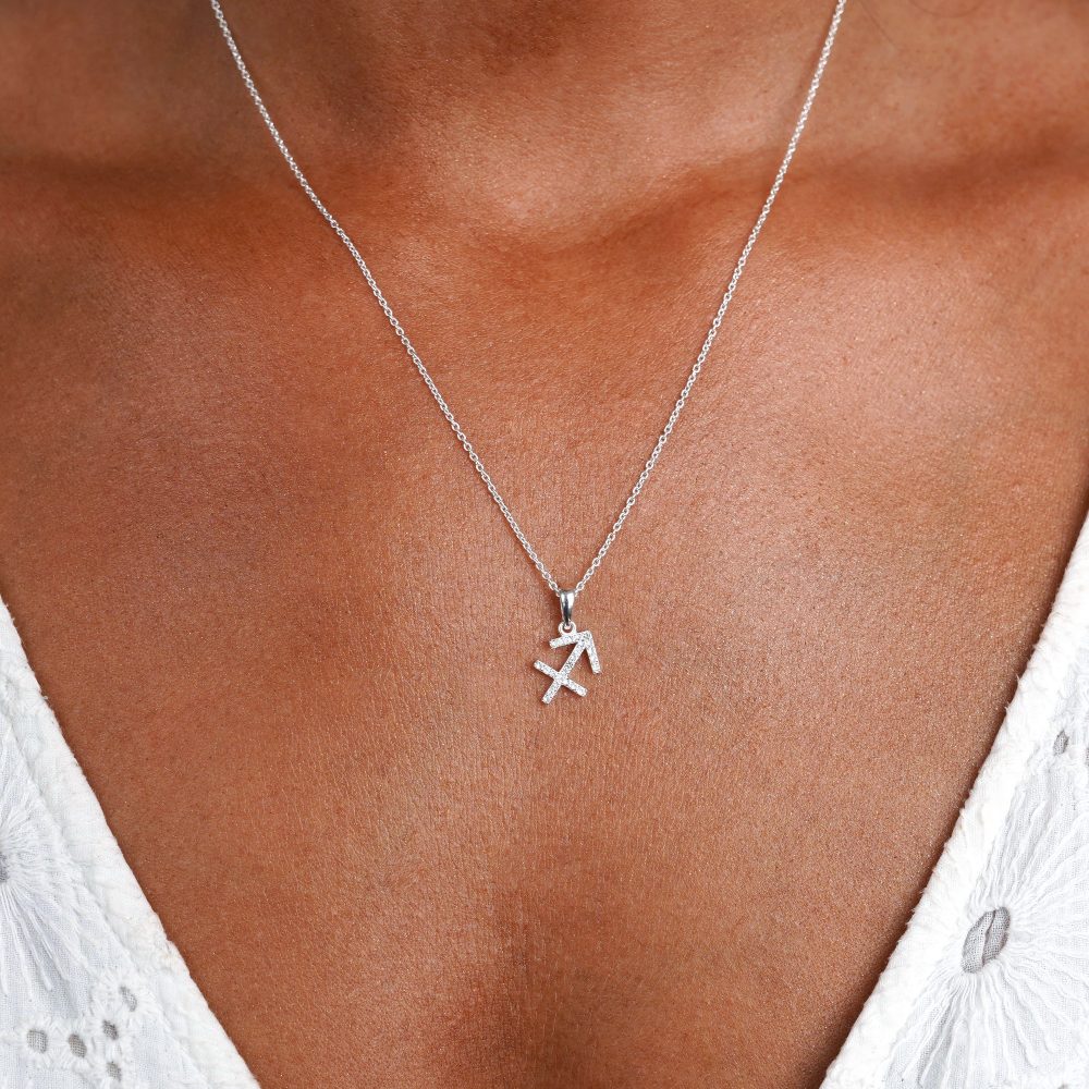 Silver necklace with Sagittarius filled with White Topaz crystals. Gemstone necklace with the Archer)sign. 